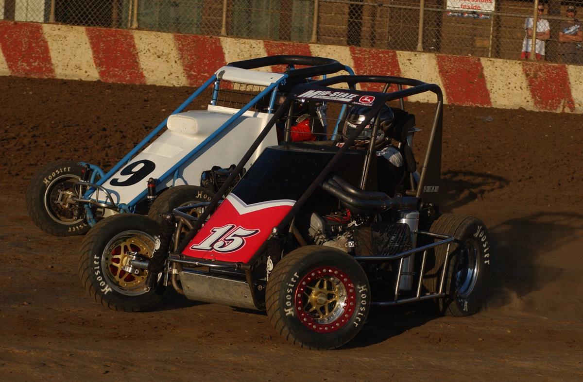 Photo by (Roger Hamilton) Waelti returns and wins, Brandon Waelti of Sun Prairie won the 20 lap
feature event Sunday night at Angell Park Speedway, here he races under Mike Stroik.