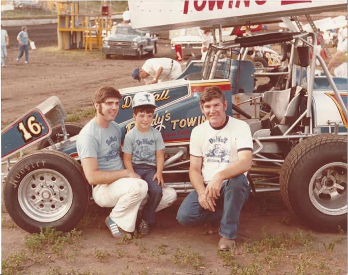 A Grandfather who is both cowboy and race car driver.