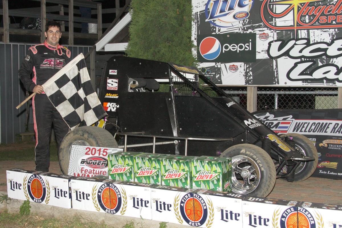 Photo by (Bob Cruse) David Budres won the Badger Midget feature.