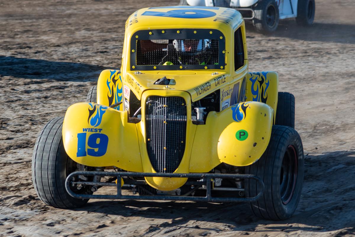 WIEST DRIVES THROUGH THE FIELD FOR VICTORY