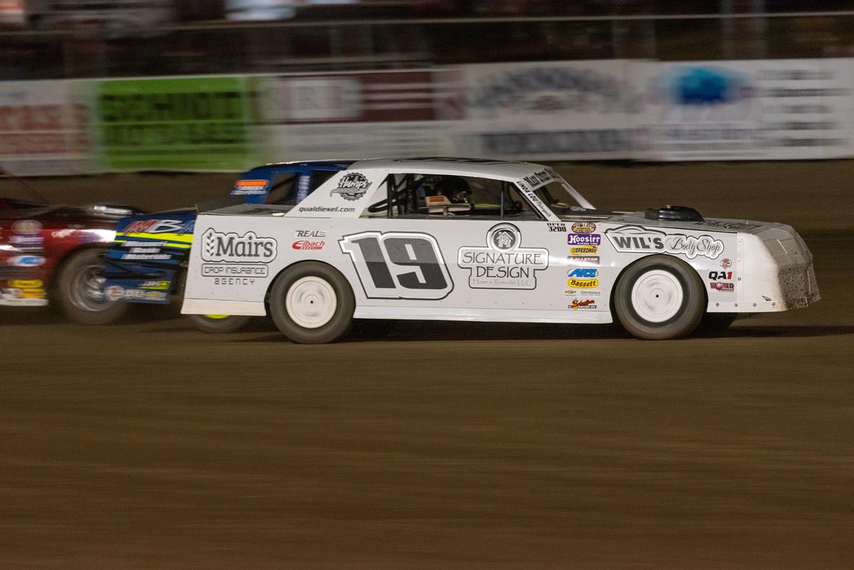 CARTER HOLDS OFF ANDERSON FOR SEASON OPENER VICTORY