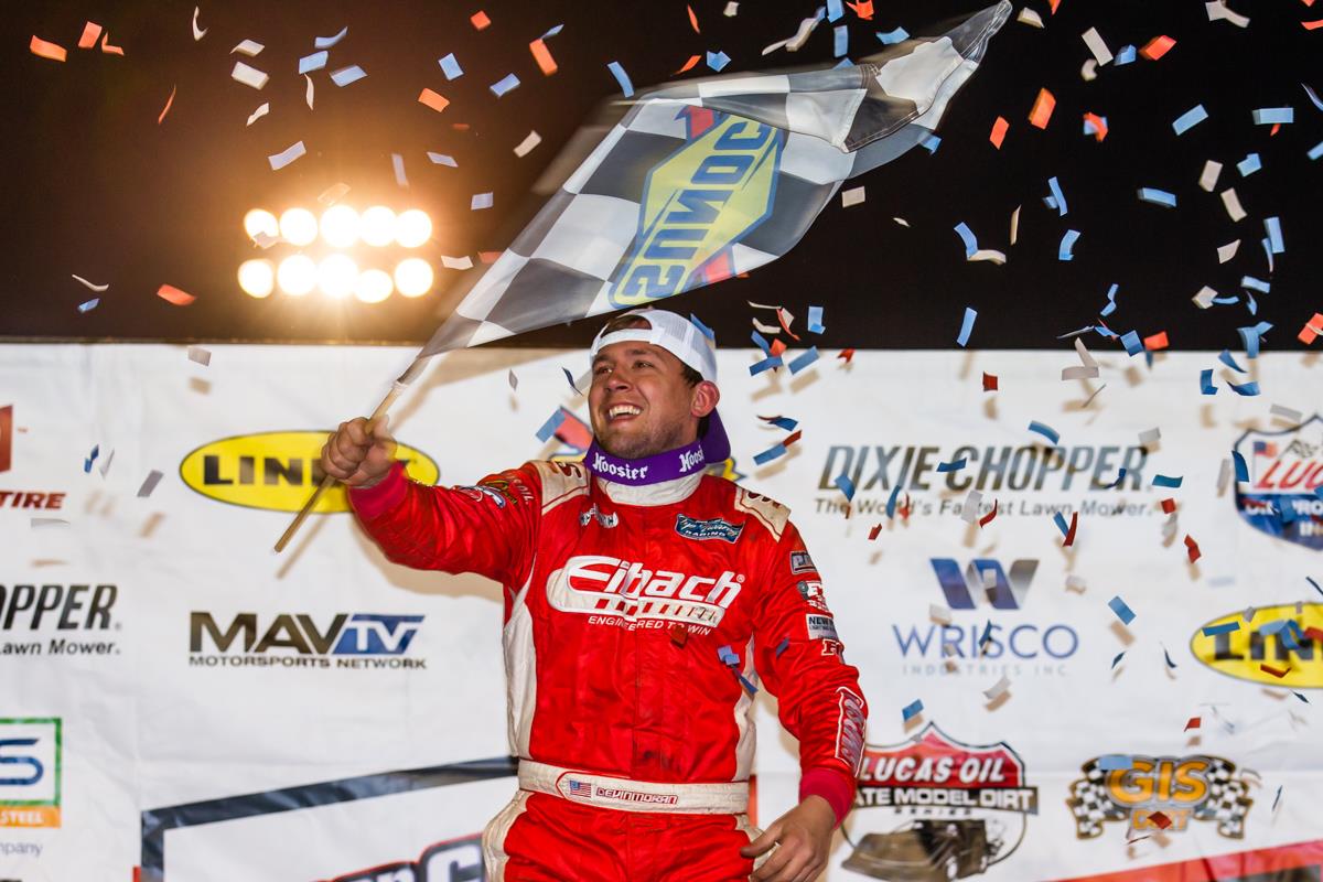 Devin Moran in Lucas Oil Victory Lane with the Sunoco Racing Flag