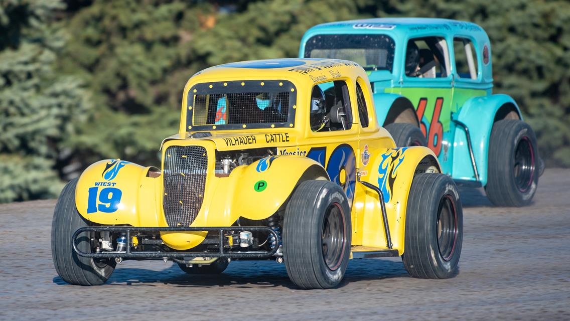 WIEST WINS BY INCHES