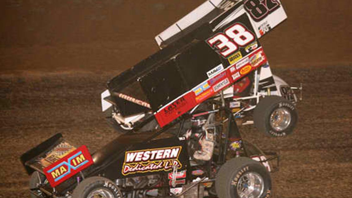 Wayne Johnson (38) and Aaron Reutzel (87) battle for the Bullring Nationals preliminary feature lead at Placerville Speedway in Friday night&#39;s Lucas Oil ASCS presented by K&amp;N Filters National feature event atop the high-banked, 1/4-mile clay oval. (Stacy Verrall photo)