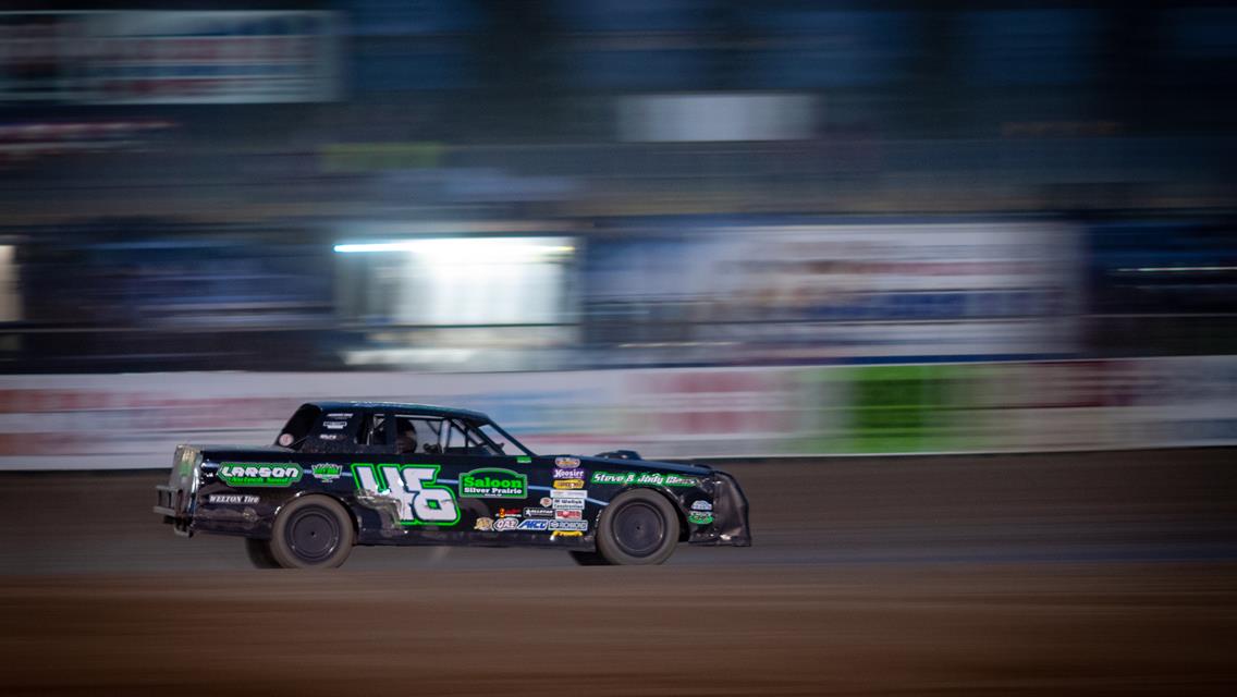Carter Hangs on to Win Season Opener