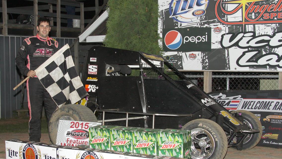 Photo by (Bob Cruse) David Budres won the Badger Midget feature.