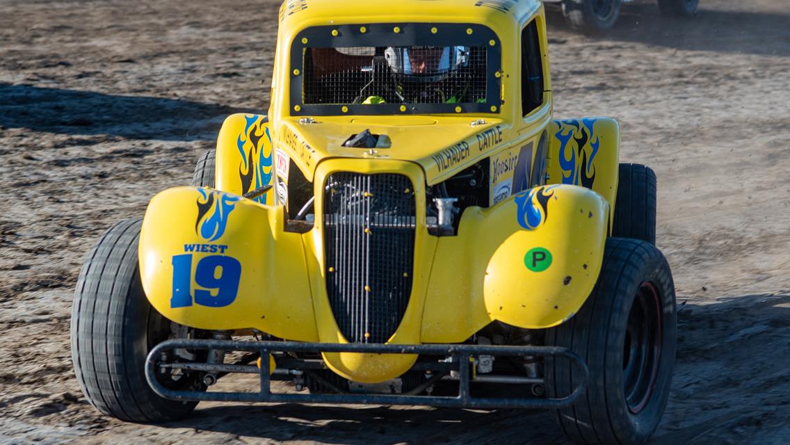 WIEST DRIVES THROUGH THE FIELD FOR VICTORY