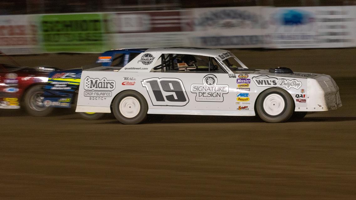 CARTER HOLDS OFF ANDERSON FOR SEASON OPENER VICTORY