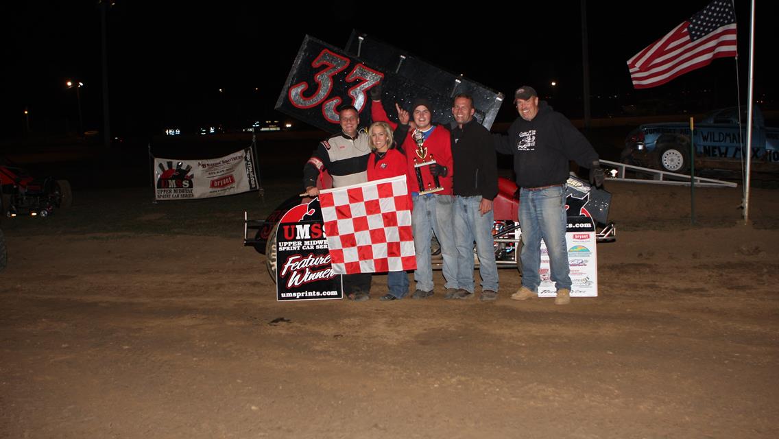 Scott Broty is joined by his crew in Victory Lane at St. Croix Valley raceway 9-17-11.