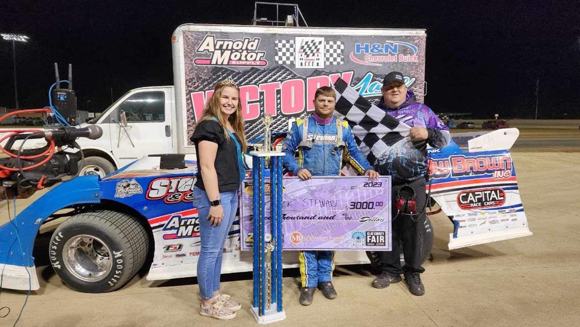 Derrick Stewart flies Malvern Bank Late Model checkers at Clay County Fair