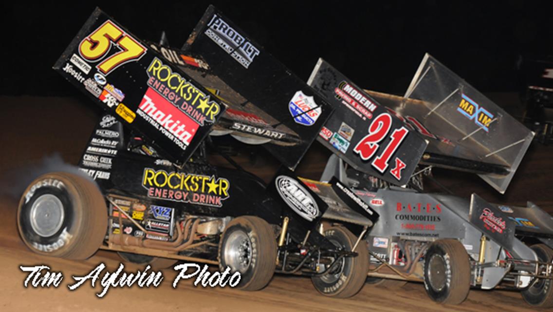Battling here with Jimmy Hurley (21x), current Lucas Oil Sprint Car points leader Shane Stewart established himself as an early frontrunner for 24th Annual COMP Cams Short Track Nationals presented by Hoosier Tires honors by winning both his heat race and qualifying race before rain cut Thursday night&#39;s action short at Little Rock&#39;s I-30 Speedway. (Tim Aylwin photo)