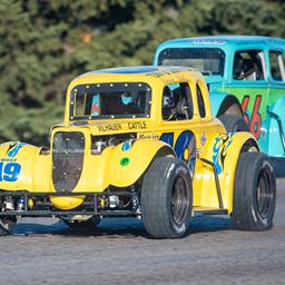 WIEST WINS BY INCHES
