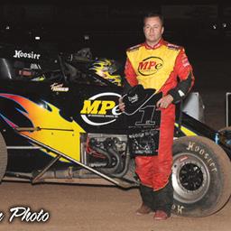 Tracy Hines wired Friday night&amp;#39;s Sunoco Fuel ASCS Canyon Region main event at the 44th Annual Kronik Energy Western World Championships at Tucson&amp;#39;s USA Raceway. (Tim Aylwin photo)