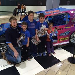Driver Anthony Roth poses with some young fans at the Cooper/RAD Racing display at Gateway Mall in Lincoln, NE in March, 2015.