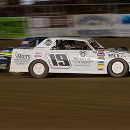 CARTER HOLDS OFF ANDERSON FOR SEASON OPENER VICTORY