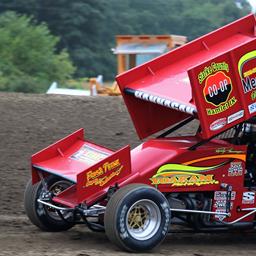 HANNAGAN SETS TRACK RECORD AND WINS FEATURE