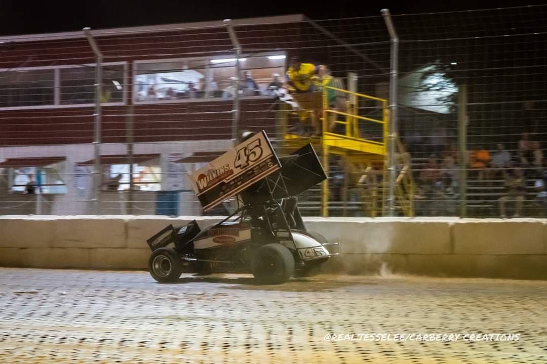 "The Cobra" Chuck Hebing Takes the Checkers for first time as a URC Winner at Clinton County. (Photo Cred: Jesse Carberry)