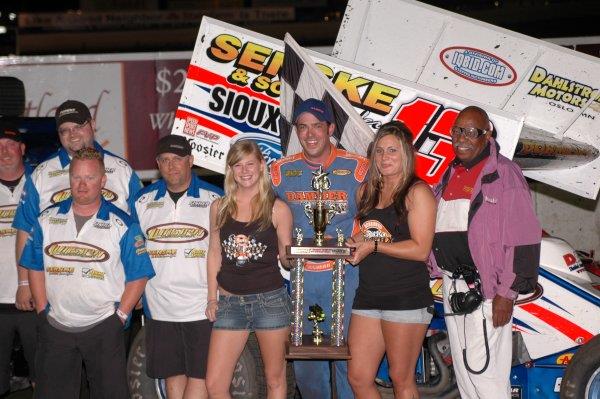 Mark and crew in victory lane at Huset's