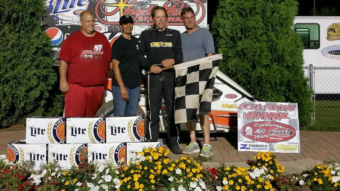“Mayhew tops Angell Park Badger field”                                                              ”Track season finale next Sunday Sept. 4”