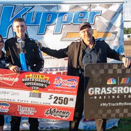 ZENZ HOLDS OFF FATHER FOR WIN